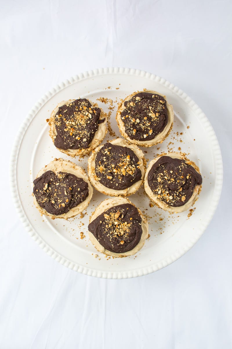 mini vegan peanut butter pies with pretzel crust and dark chocolate ganache | Appetites Anonymous