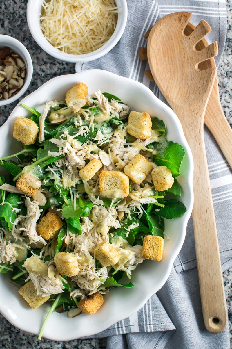baby kale and shredded chicken caesar salad | Appetites Anonymous